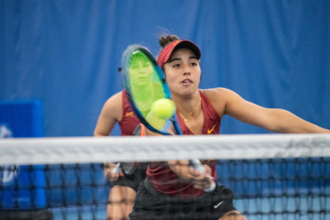 Sofia Cabezas receives the ball close to the net during her match against Drake University at the Roger Knapp Tennis Center on Jan. 14, 2023.