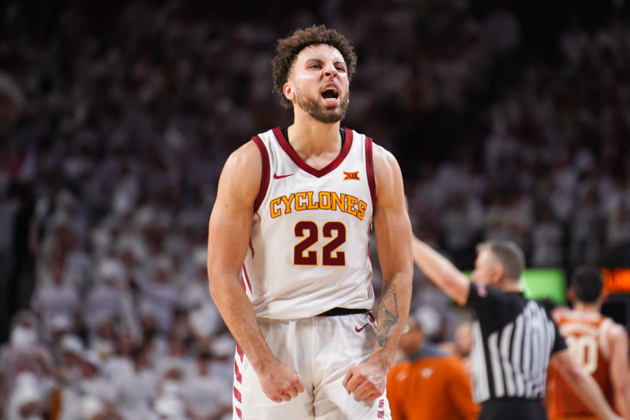 Gabe Kalscheur flexes his muscles after Texas calls a second half timeout on Jan. 17, 2023.