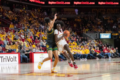 Nyamer Diew drives into the paint during the game against Baylor in Hilton Coliseum on Feb. 4, 2023.