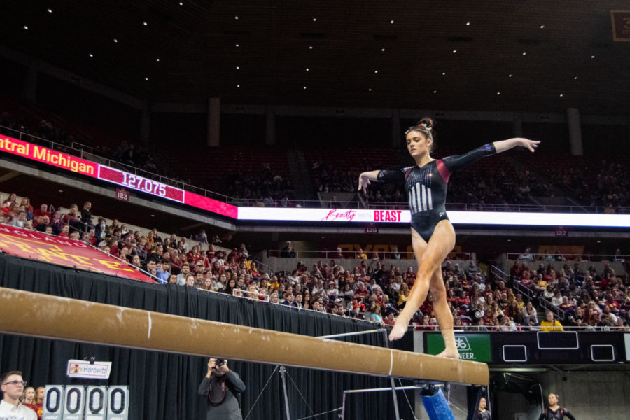 Natatlie+Horowitz+begins+her+beam+routine+during+the+match+against+Central+Michigan+in+Hilton+Coliseum+on+Feb.+12%2C+2023.