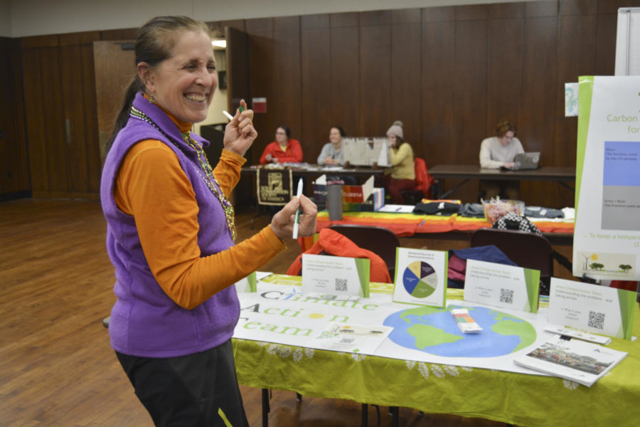 Jeri Neal laughs while talking to passerby at the Sustainapalooza on Feb. 21, 2023.