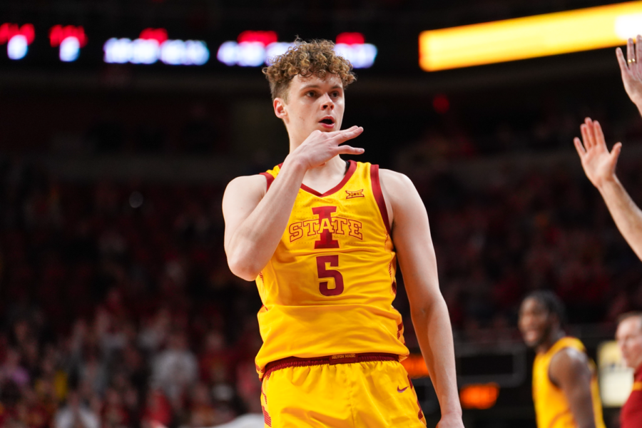 Aljaz Kunc celebrates a 3 in front of the Cyclone bench against TCU on Feb. 15, 2023.