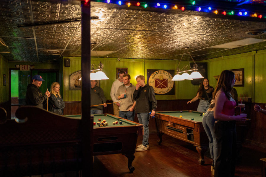 Students drinking and enjoying the music and playing pool at Paddys, Feb. 5.