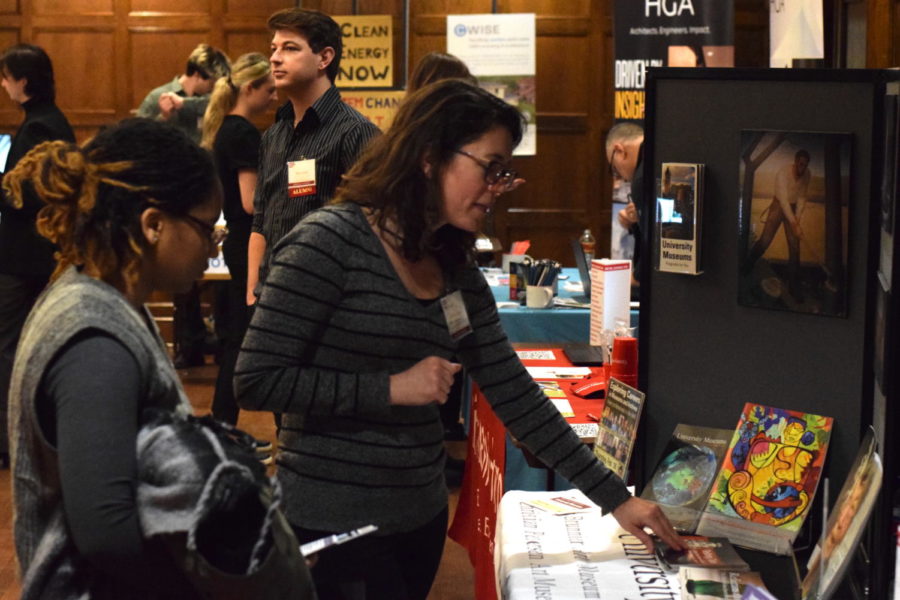 Tamaiah Crawford (left), a freshman in pre-integrated studio arts, pictured while talking with a representative of the University Museums, Alisha Abner (right). Abner, a communications specialist with the University Museums, said the museums were at the fair promoting events and seeking students interested in internships.