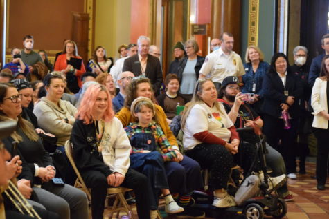 Eleven-year-old Noah McIver sits with his mother Julie Betts among a crowd of protesters and legislators in the Iowa Capitol. 

It is not going to stick for very long, McIver said. Because there are going to be people who will be fighting for the right to exist.