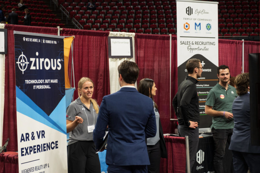 An Iowa State students speak with a company representative of Zirous Inc. at the Iowa State Spring Business Career Fair at Hilton Coliseum, Feb. 8.  
