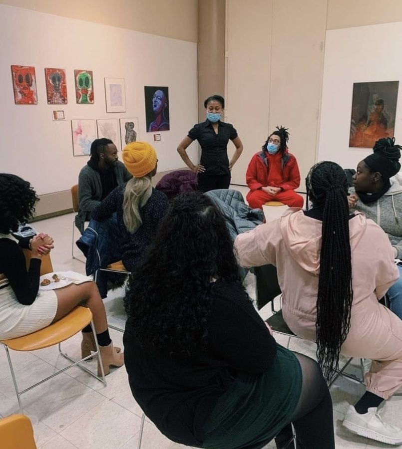 Artists gather at the reception for the Black Art Exhibit in 2022. 