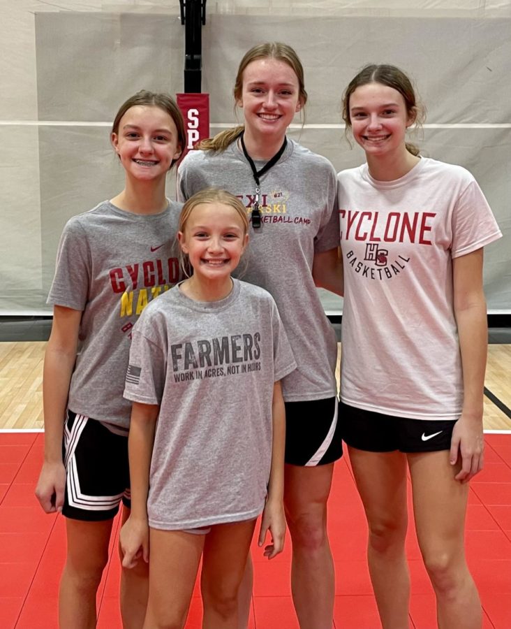 Schwieso sisters, Mia, Kendall and Aubrey training with womens basketball player Lexi Donarski.