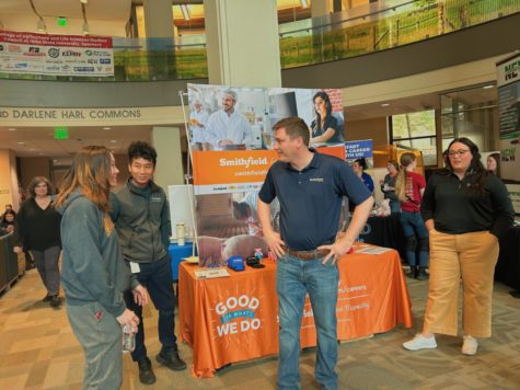 Students network with agriculture companies at the National Agriculture Day celebration in Curtiss Halls Harl Commons. 