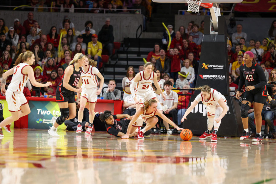 Ashley Joens pushes the ball to Morgan Kane against Texas Tech on March 4, 2023.
