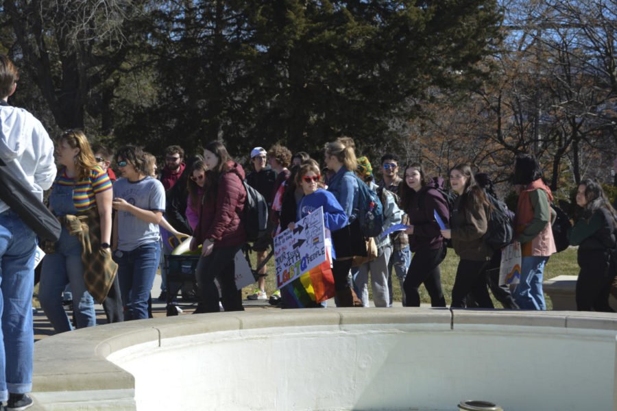 Members of the LGBTQIA+ walkout head toward Parks Library on March 1, 2023.