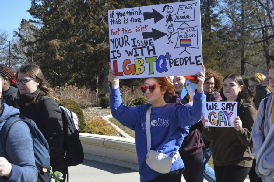 Jackie+Kluesner%2C+an+English+education+major%2C+holds+their+sign+in+the+LGBTQIA%2B+walkout+on+Iowa+States+campus+March+1%2C+2023.