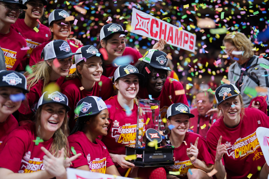 Iowa State players pose with their Big 12 Championship trophy after ISUs Big 12 Championship win over Texas, 61-51. Municipal Auditorium in Kansas City, MO, Mar. 12, 2023.