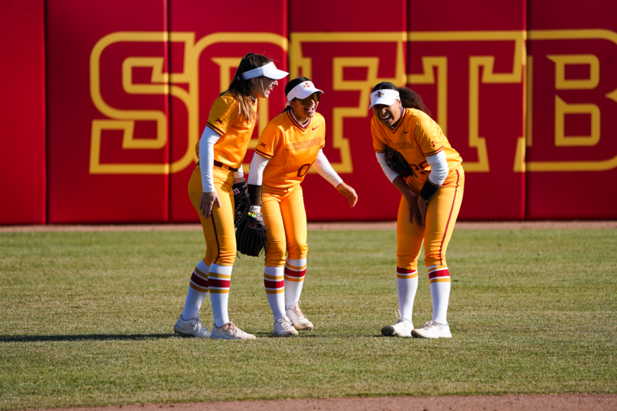 The Cyclone outfield laughs during a break in action in game one against Oklahoma on Mar. 24, 2023.