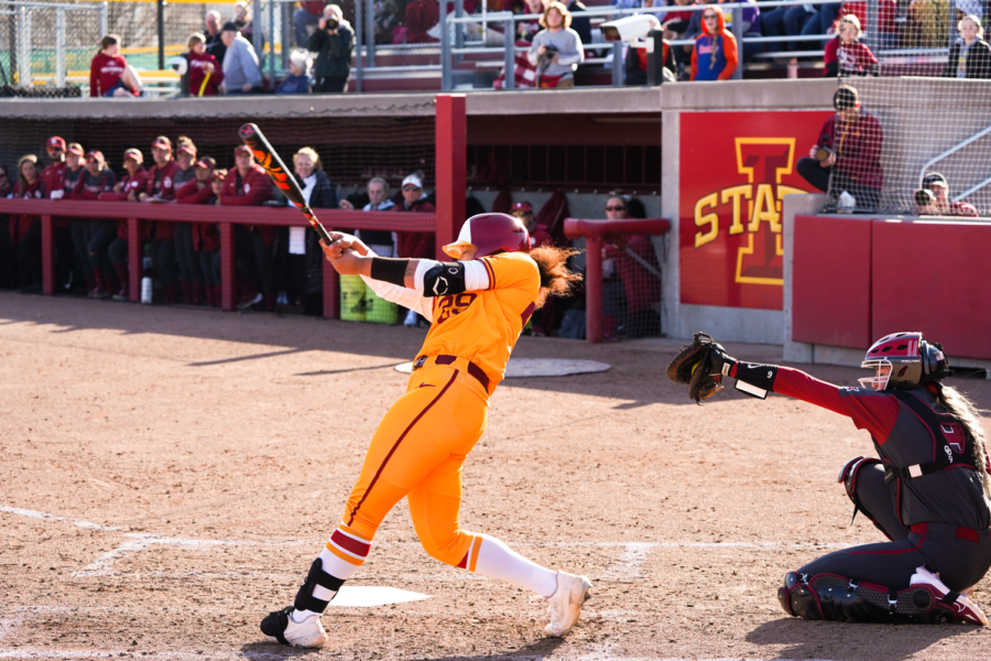 Tiana+Poole+swings+the+bat+in+game+one+against+Oklahoma+on+Mar.+24%2C+2023.