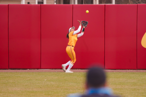 Tiana Poole tracks down a fly-ball in right field in game one against Oklahoma on Mar. 24, 2023.