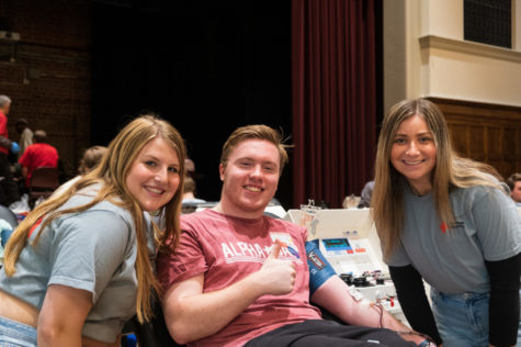 Emily Carreon (junior in journalism and mass communication), Andrew Bosin (junior in mechanical engineering) and Olivia Payne (sophomore in animal science) at the spring 2023 Blood Drive in the Memorial Union. Bosins blood donation has the potential to save up to three lives. 
