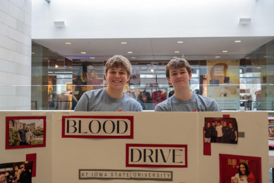 Brooks Wee, freshman in animal ecology and Myles Alexander, freshman studying mechanical engineering running the blood drive booth outside the MU bookstore  