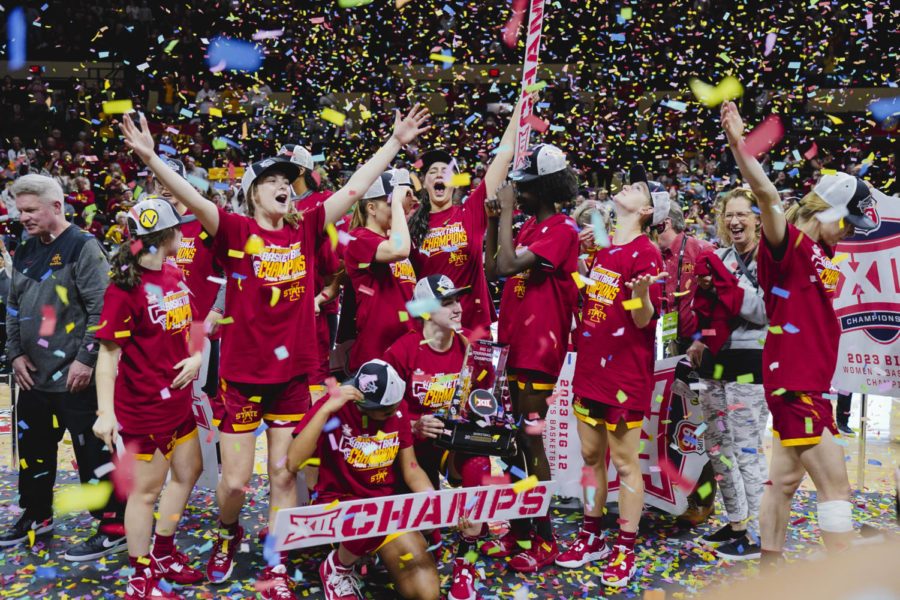 The+Iowa+State+womens+basketball+team+celebrates+on+stage+after+ISUs+Big+12+Championship+win+over+Texas%2C+61-51.+Municipal+Auditorium+in+Kansas+City%2C+MO%2C+Mar.+12%2C+2023.