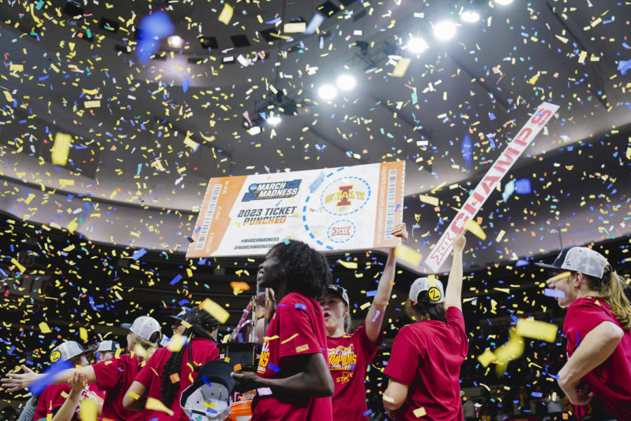 The Iowa State womens basketball team celebrates The Iowa State womens basketball team celebrates with their ticket punched March Madness sign on stage after ISUs Big 12 Championship win over Texas, 61-51. Municipal Auditorium in Kansas City, MO, Mar. 12, 2023.