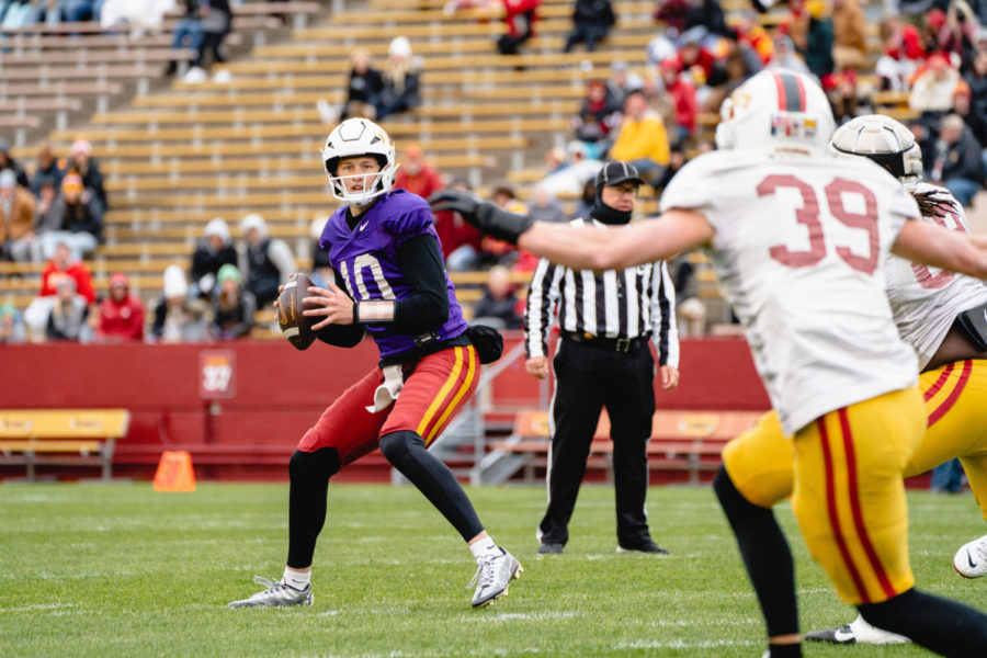 Freshman quarterback JJ Kohl drops back, searching for an open receiver at the Iowa State Spring football game, Jack Trice Stadium, April 22.
