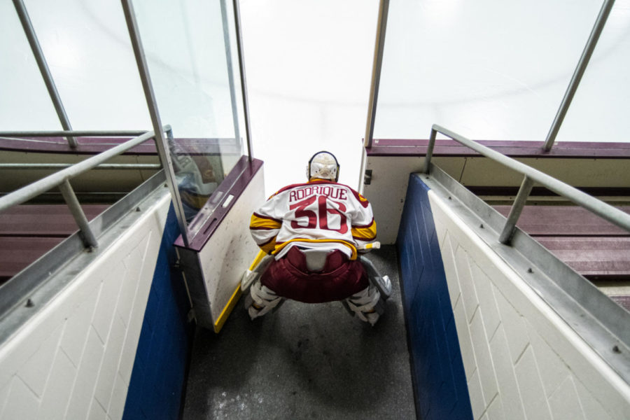 Danick Rodrigue prepares himself in the tunnel before taking the ice ahead of the game against Roosevelt University in the Ames/ISU Ice Arena on December 4th, 2021. 