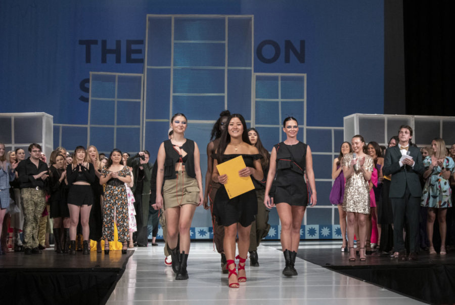 Angel Tiengkham, designer of WHO IS YOUR CONNECTION?, walks the runway with her models after winning the Best In Show scholarship at the end of The Fashion Show on April 15, 2023, in C.Y. Stephens Auditorium.