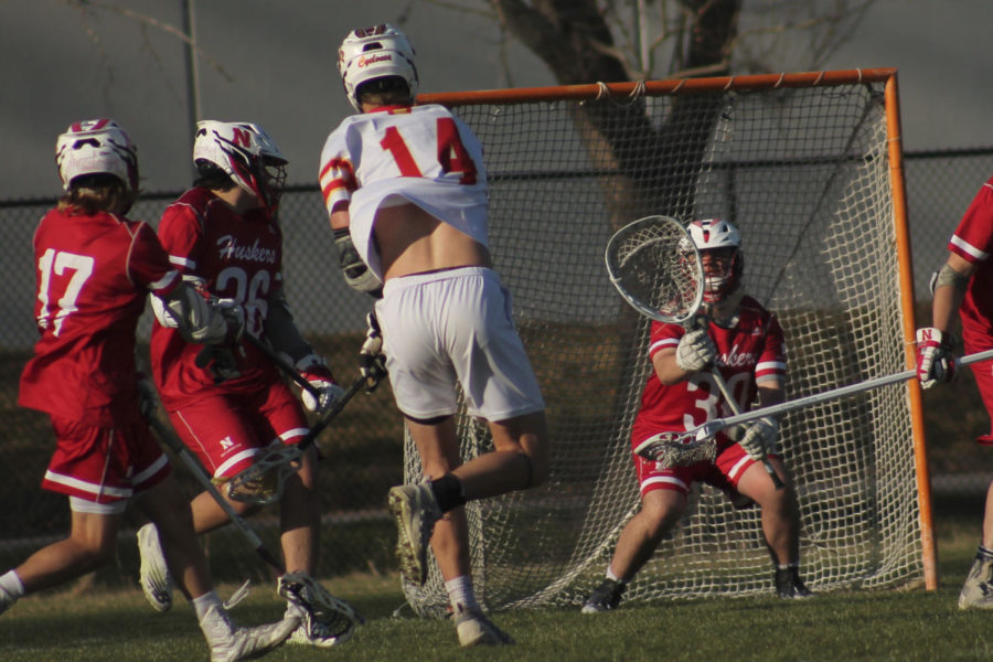 Joe Burns taking a shot on the opposing teams goal, hoping to contribute to Iowa States 24-2 win over Nebraska.