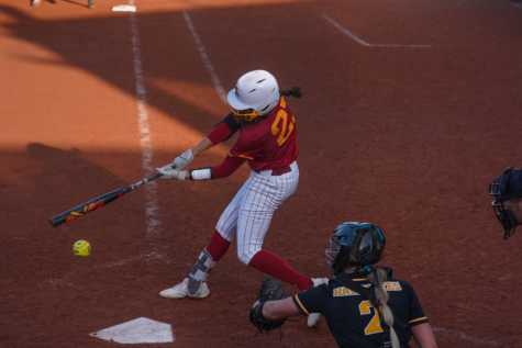 Angelina Allen gets a base hit against Iowa on Apr. 26, 2023.