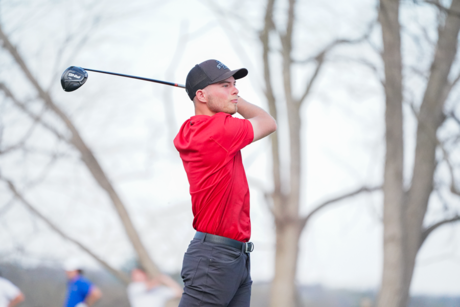 Paul Beauvy tees off at the Hawkeye Invitational on Apr. 14, 2023.