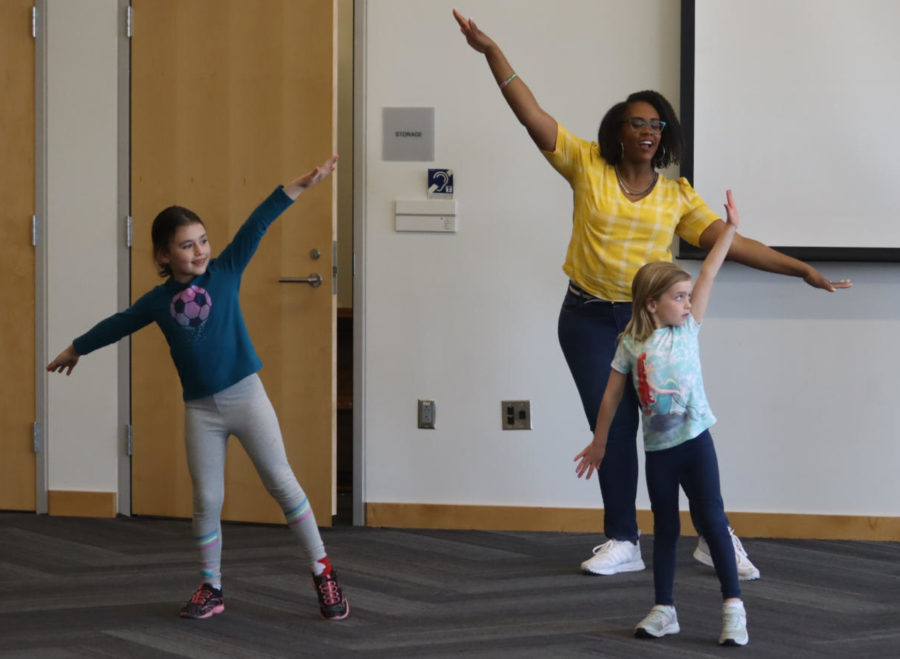 April Finley, Stormettes advisor, dancing with the kids at the Ames Public Library. 