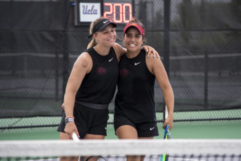 Miska Kadleckova (left) and Sofia Cabezas (right) embrace after defeating UCLAs Fangran Tian and Anne-Christine Lutkemeyer, ultimately giving Iowa State the doubles point in the third round of the NCAA D1 Womens Tennis Championship tournament in Ames, IA, on Friday, May 12, 2023.