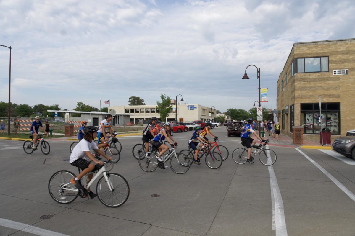 Bikers traveling in Downtown Ames.