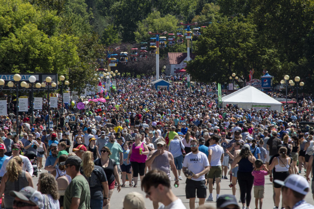 A+massive+crowd+fills+the+streets+of+the+Iowa+State+Fairgrounds+on+Saturday%2C+Aug.+12.+2023%2C+in+Des+Moines%2C+Iowa.
