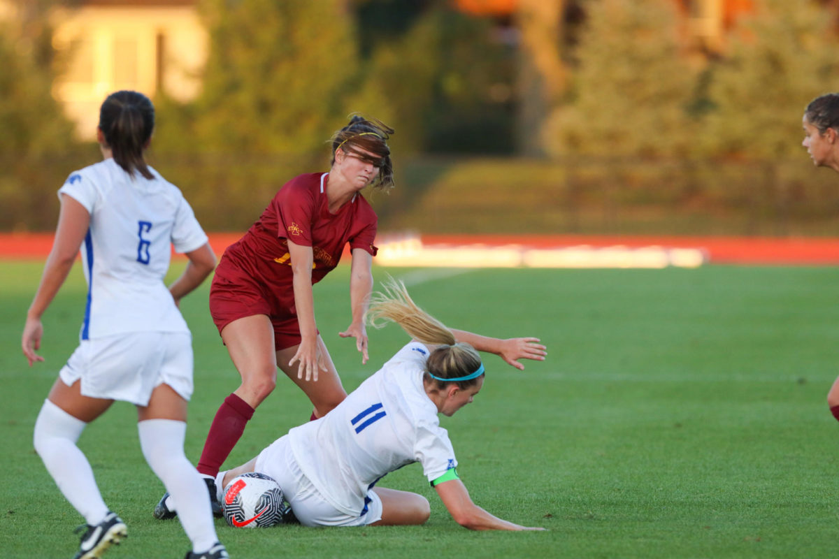 Olivia Edwards pushing a Memphis defender down during the Iowa State vs. Memphis match, Cyclone Sports Complex, Aug. 31, 2023.