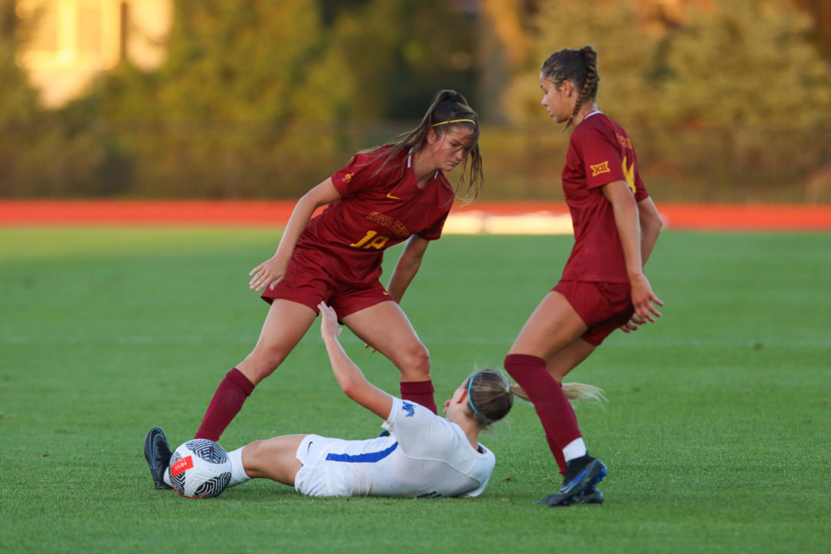 Olivia Edwards looking down at a Memphis defender after a collision during the Iowa State vs. Memphis match, Cyclone Sports Complex, Aug. 31, 2023.