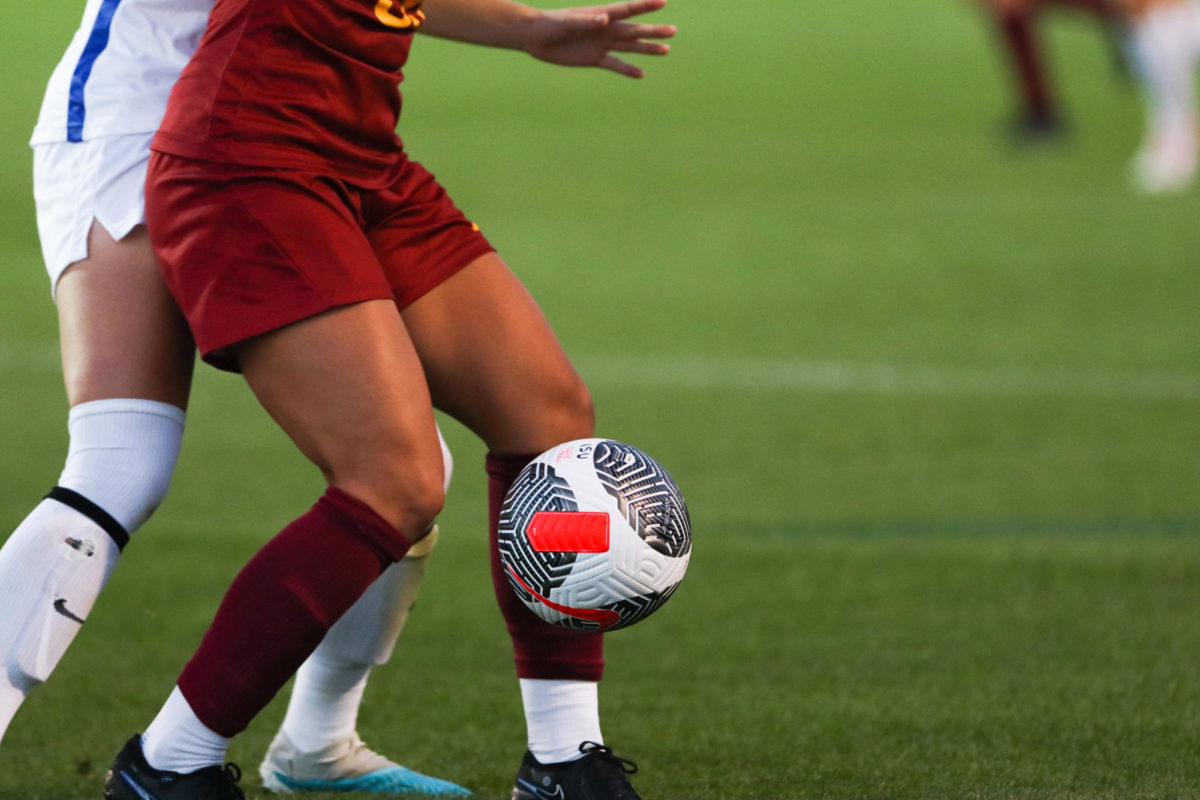 Kristin Boos trying to get around Memphis defenders during the Iowa State vs. Memphis match, Cyclone Sports Complex, Aug. 31, 2023.