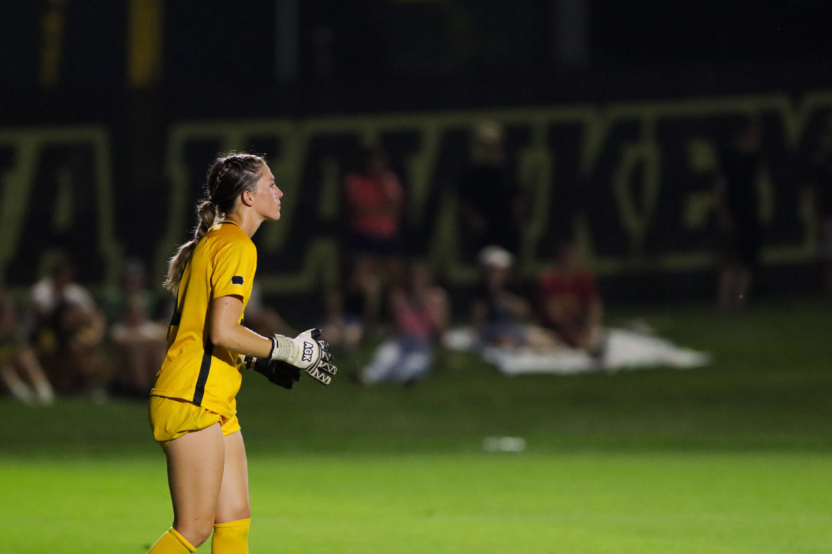 Iowas goalkeeper watching her teammates from the goal during the CyHawk soccer game, University of Iowa Soccer Complex, Aug. 24, 2023.
