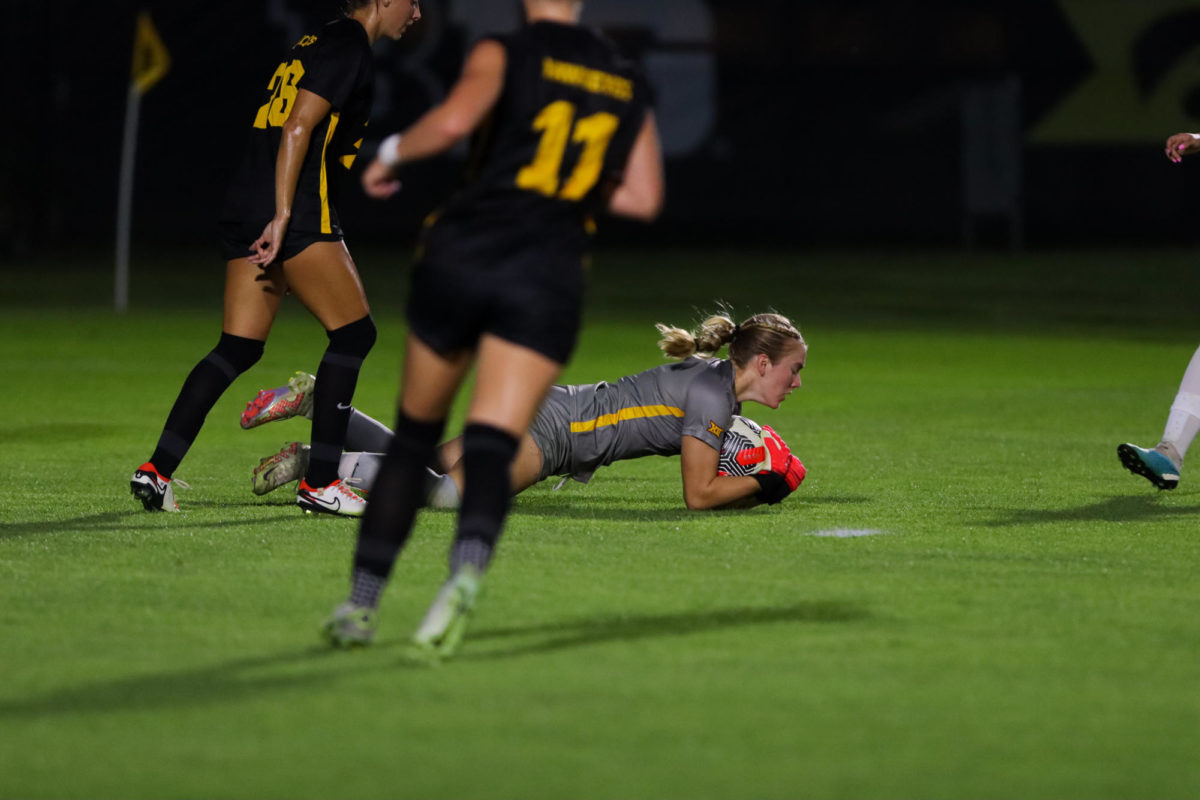 Avery Gillahan saves a shot during the Cy-Hawk Soccer Game, University of Iowa Soccer Complex, Aug. 24, 2023.
