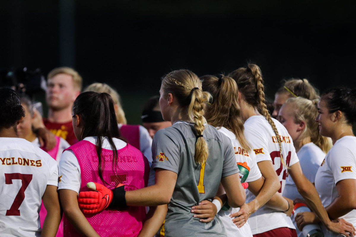 Avery Gillahan in the team huddle before the Cy-Hawk Soccer Game, University of Iowa Soccer Complex, Aug. 24, 2023.