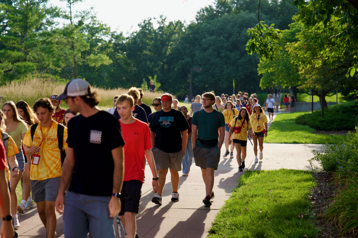 New and old students walking towards Lied Rec Center for the Iowa State Welcome Cookout on Aug. 18, 2023.