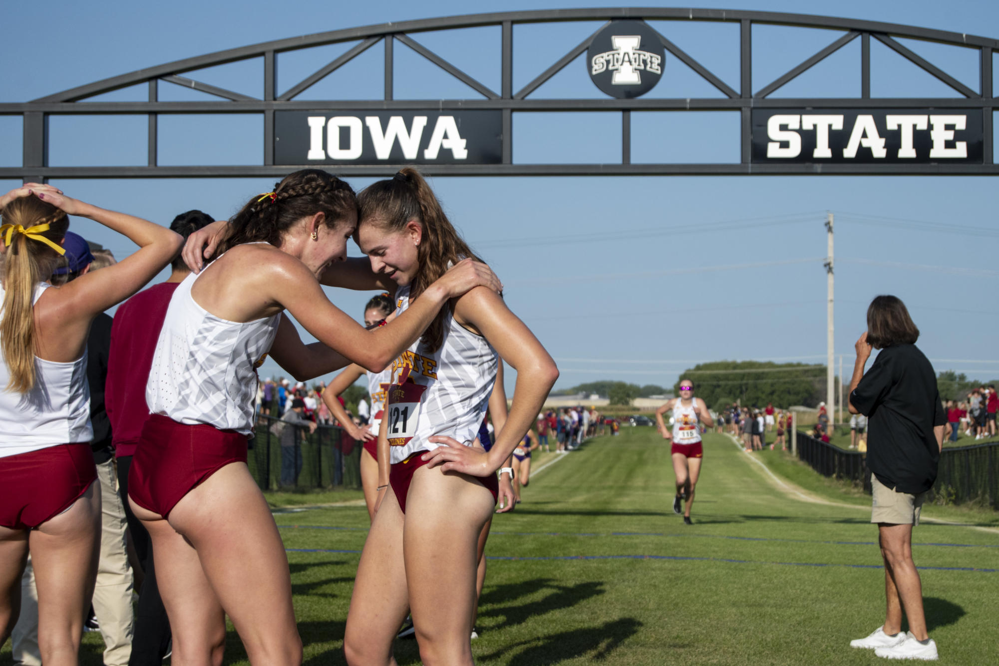 Competitors catch their breath after finishing the women’s 5k race during the Cyclone Preview meet on Friday, Sept. 1, 2023, at the Iowa State University Cross Country Course in Ames, Iowa. Iowa State would eventually take first place in both the women’s and the men’s race.
