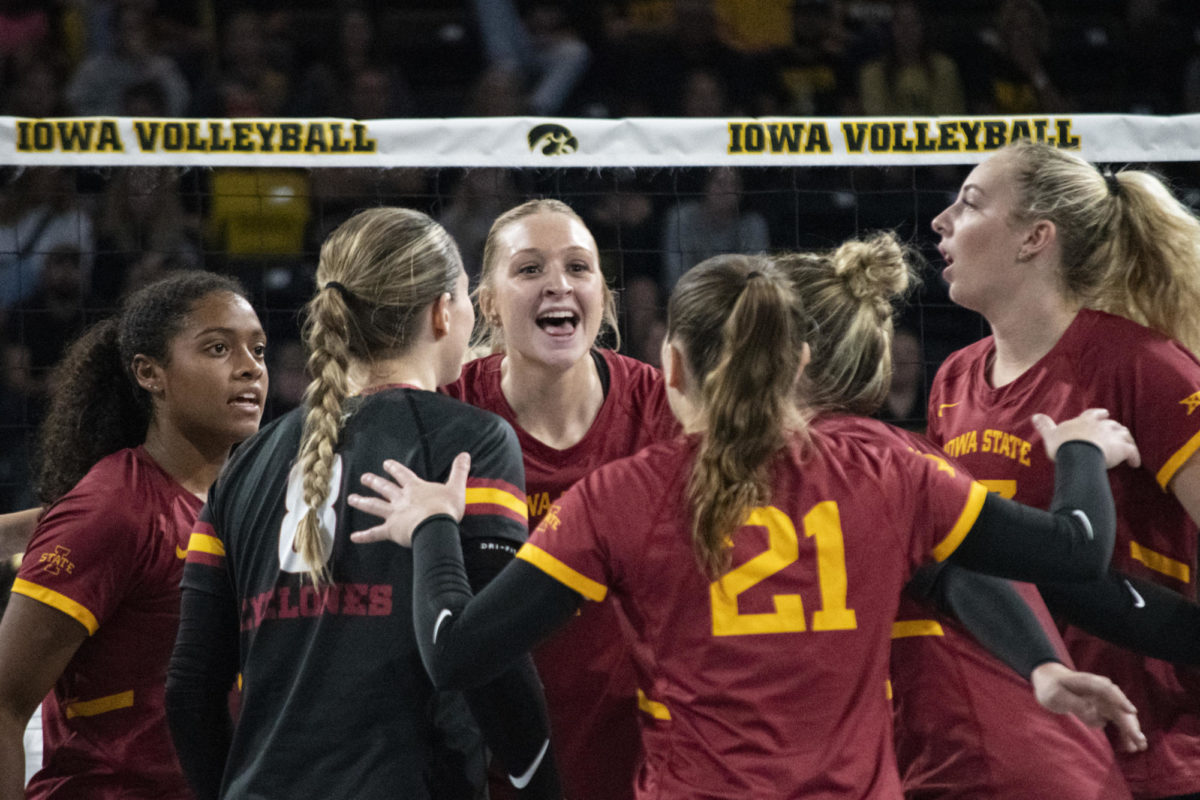The Iowa State volleyball team huddles after scoring a point during the game against Iowa in the Iowa Corn Cy-Hawk Series on Wednesday, Sept. 6, 2023, at the Xtreme Arena in Coralville, Iowa.
