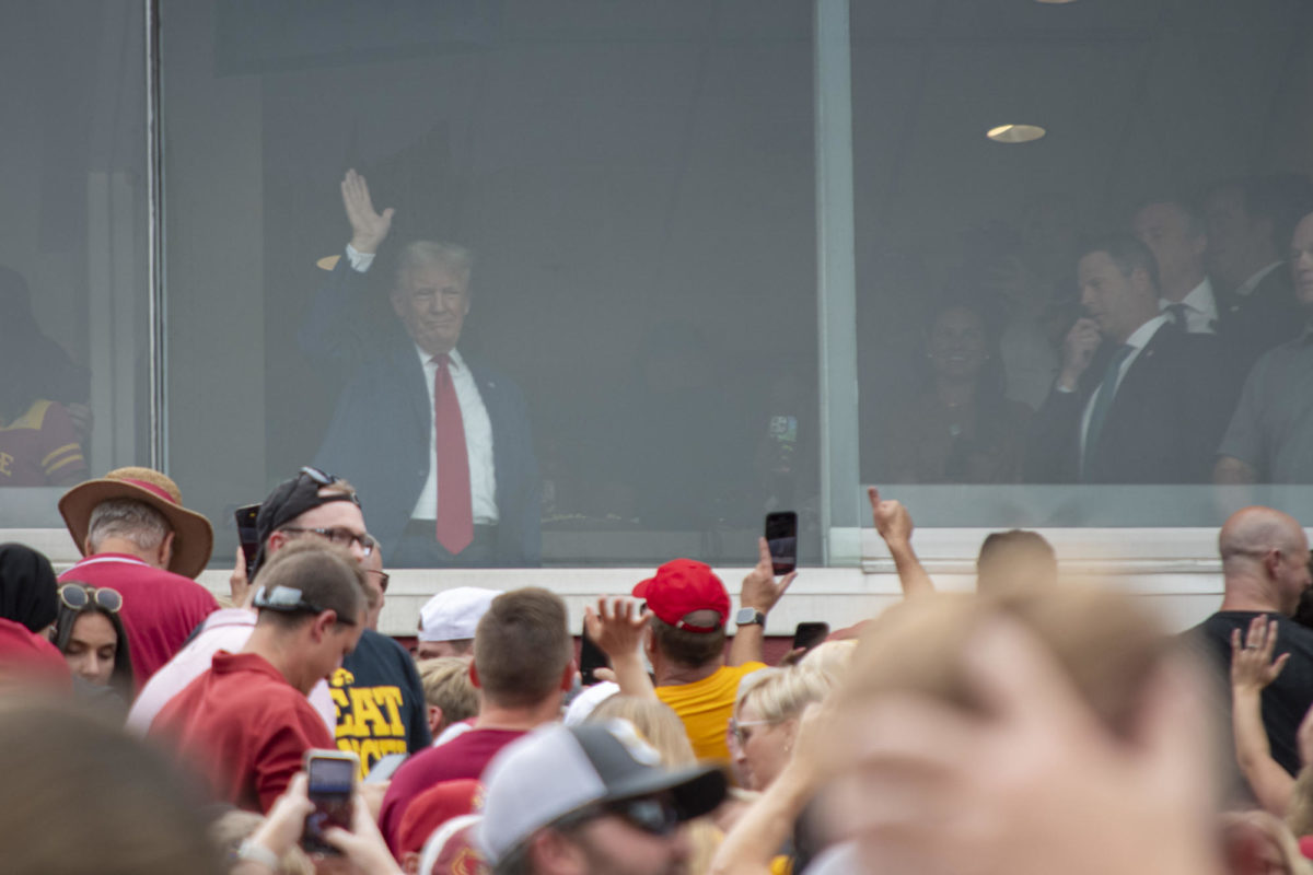 Former President Donald Trump waves to the crowd before the Iowa Corn Cy-Hawk Series football game on Saturday, Sept. 9, 2023, at Jack Trice Stadium in Ames.