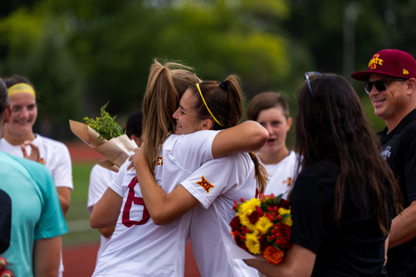 Olivia Edwards hugging her teammate Chloe Broughton during the senior night ceremony before the Iowa State vs. Kentucky match, Cyclone Sports Complex, Sept. 10th, 2023.