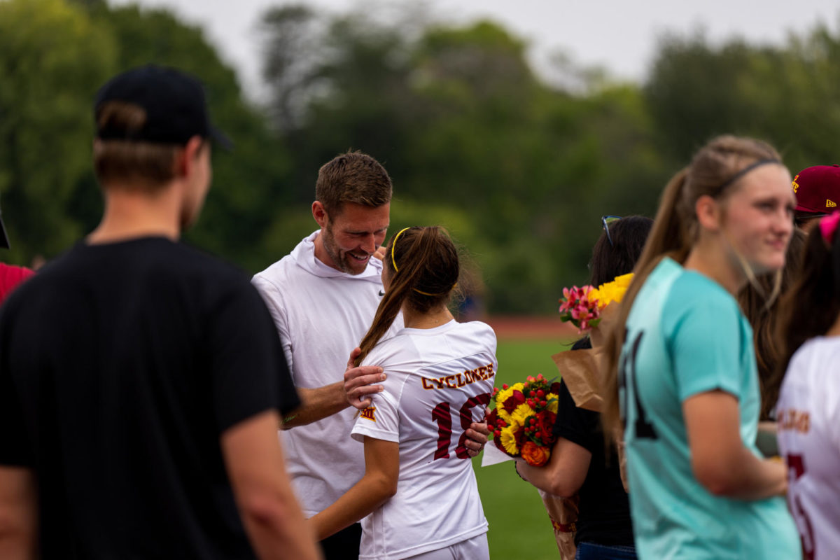 Olivia Edwards talking with head coach Matt Fannon during senior night before the Iowa State vs. Kentucky match, Cyclone Sports Complex, Sept. 10th, 2023.