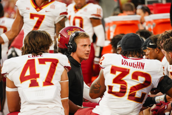 Mason Tomblin meets with the defense during the Iowa State vs. Oklahoma football game at Gaylord Memorial Stadium in Norman, Oklahoma, on Sept. 30, 2023.