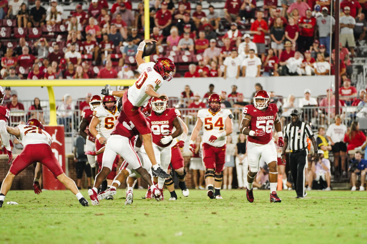 JJ Kohl jumps over the OU defense during the Iowa State vs. Oklahoma football game at Gaylord Memorial Stadium in Norman, Oklahoma, on Sept. 30, 2023.