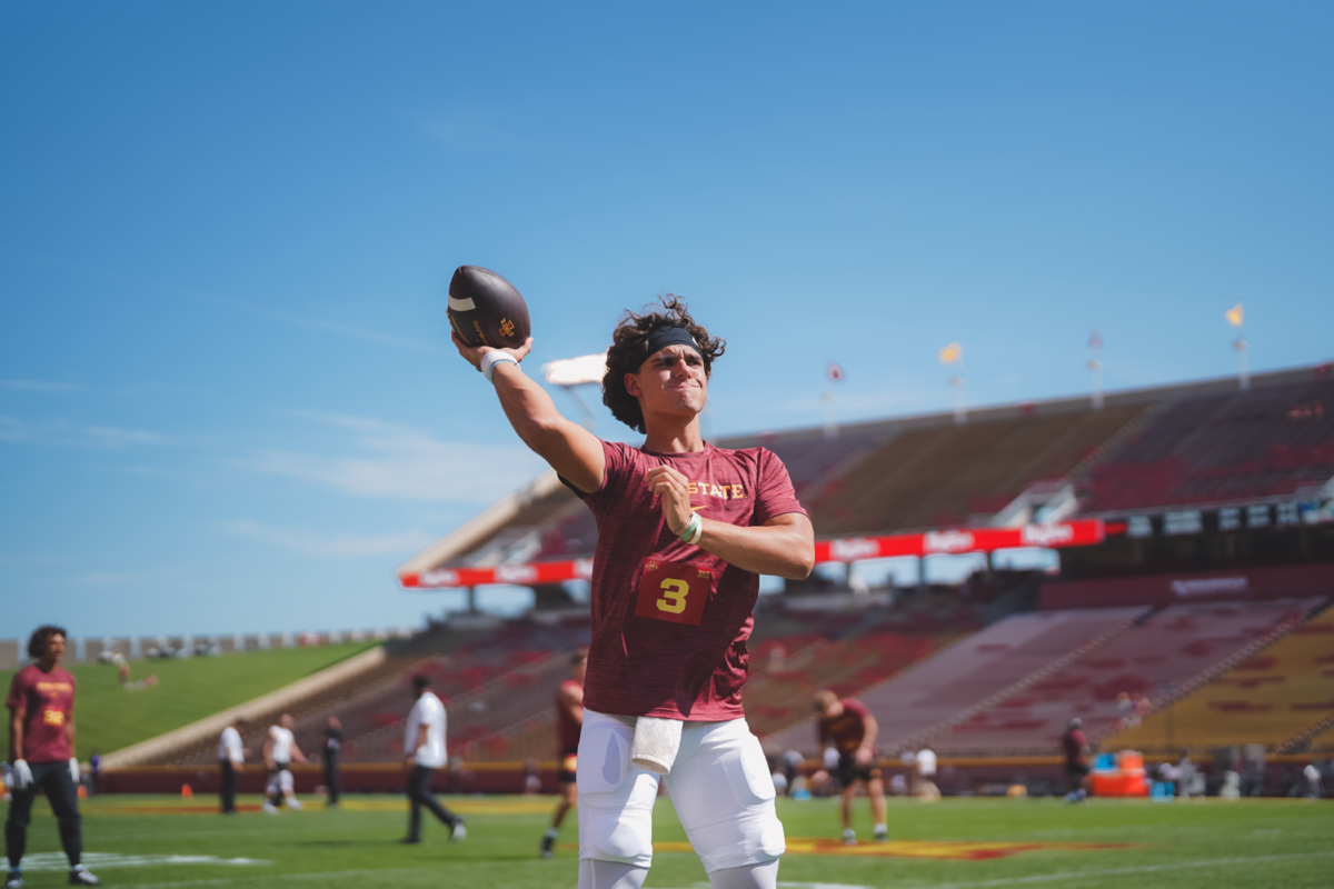 Rocco Becht warms up prior to his first start against UNI at Jack Trice Stadium on Sept. 2, 2023.