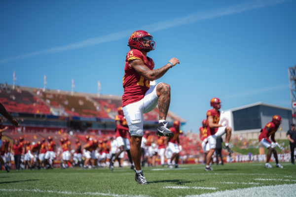 Jaylin Noel stretches during pre-game warmups before taking on UNI at Jack Trice Stadium on Sept. 2, 2023.